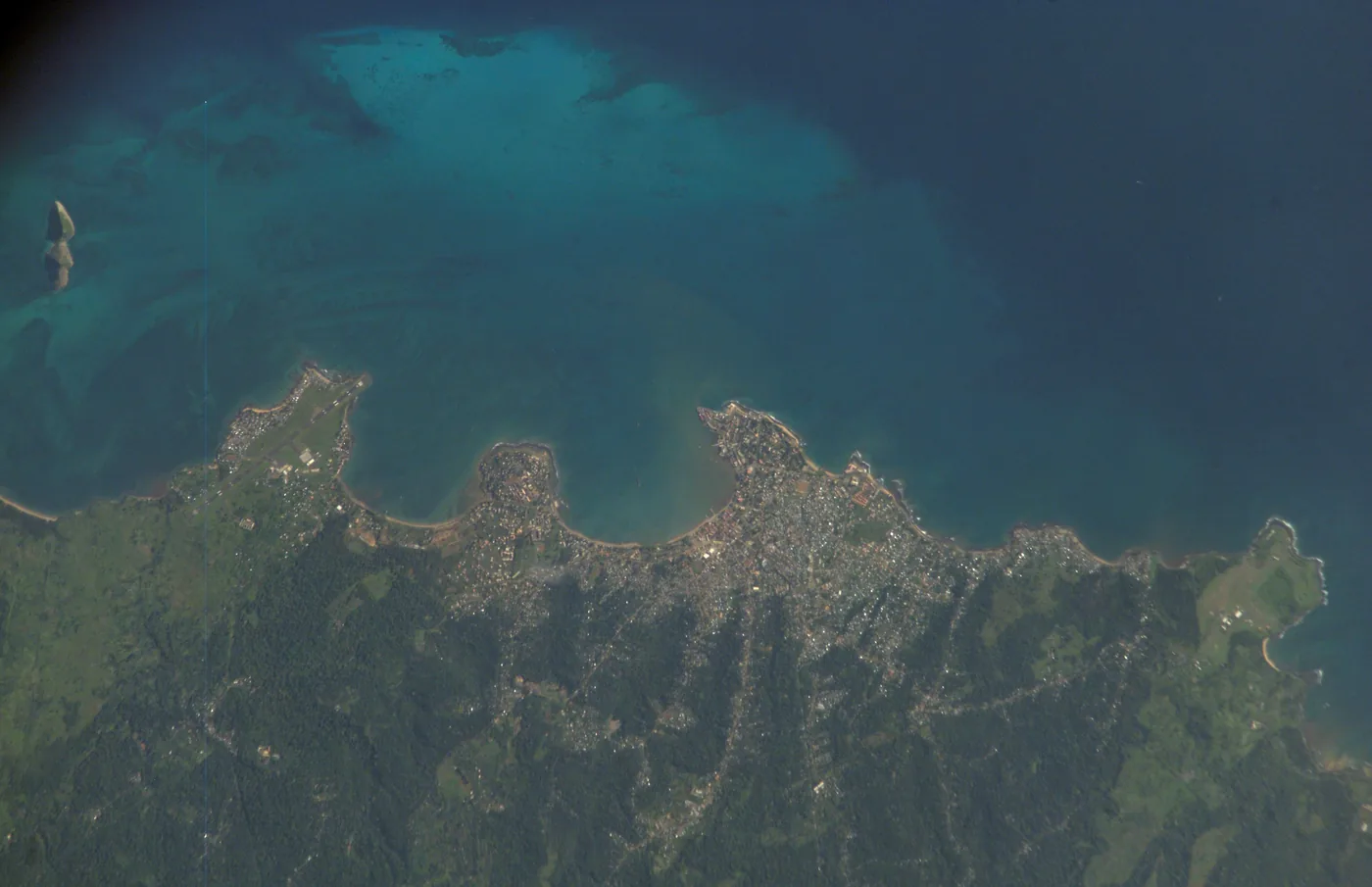 The northern coast of São Tomé island and the small Ilhéu das Cabras, photographed from the International Space Station